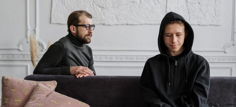 A person consulting with a therapist about the pros and cons of partial hospitalization.