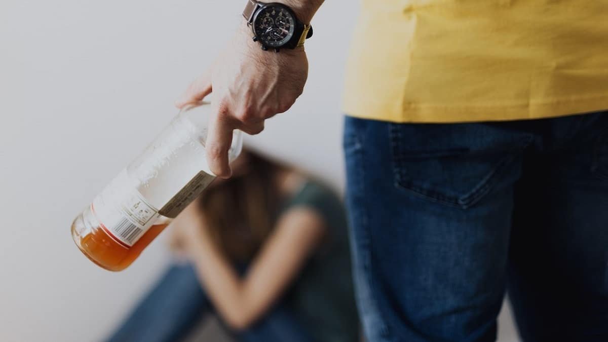 Man suffering from alcohol addiction taking part in gender base violence.