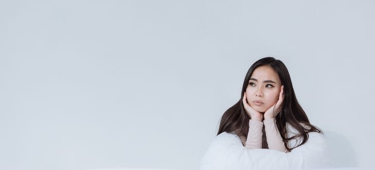 person thinking about the power of personal rehab testimonials in Boynton Beach