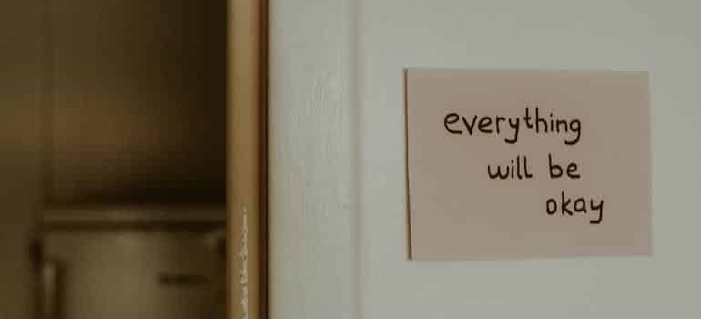 the words everything will be okay written on a paper