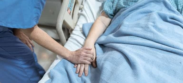 patient in a hospital bed, mixing valium and alcohol