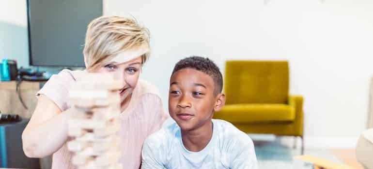 woman and child playing a game