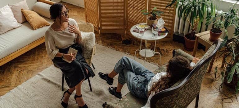 therapist talking to a patient