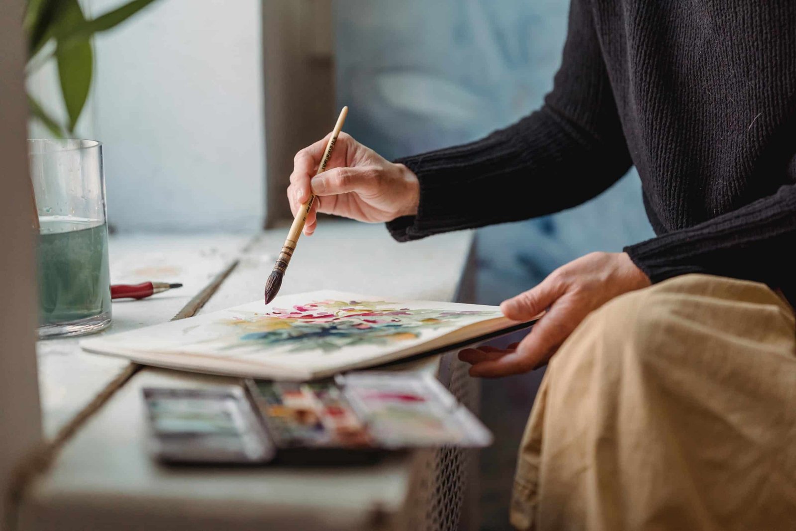 Close-up of someone painting.